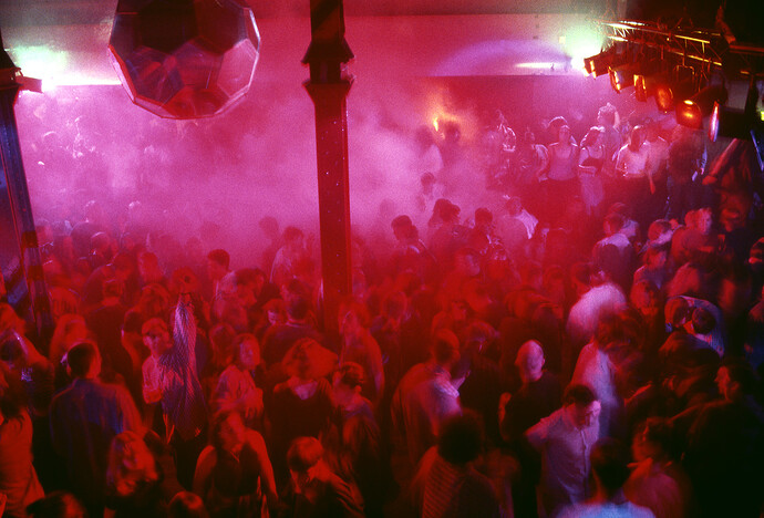 1634114804931-peter-j-walsh-rave-one-the-hacienda-main-dancefloor-bathed-in-pink-light